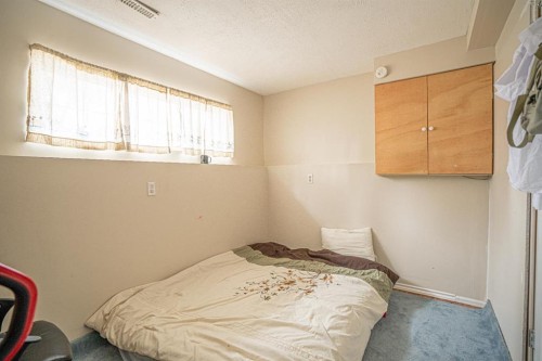 8051 Laguna Way Ne, Calgary, AB - Indoor Photo Showing Bedroom