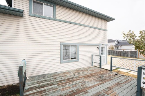 8051 Laguna Way Ne, Calgary, AB - Outdoor With Deck Patio Veranda With Exterior