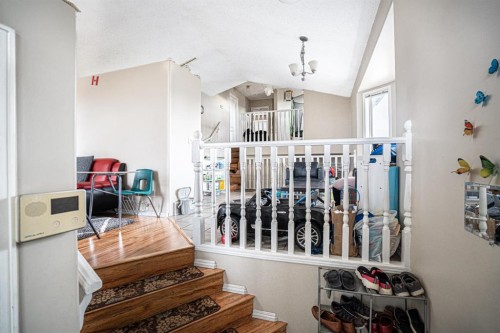 8051 Laguna Way Ne, Calgary, AB - Indoor Photo Showing Other Room