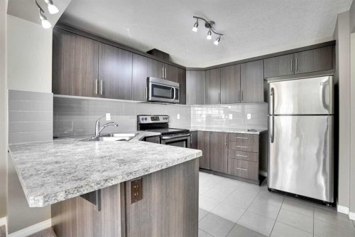 128 Cityscape Row Ne, Calgary, AB - Indoor Photo Showing Kitchen With Stainless Steel Kitchen With Upgraded Kitchen