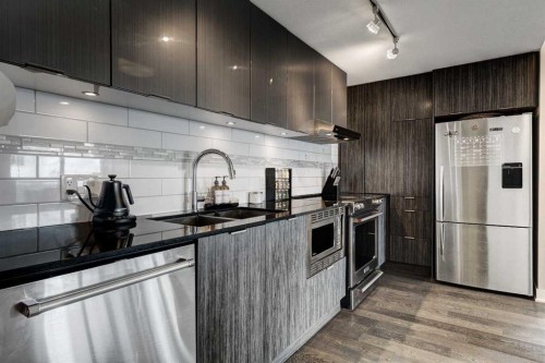2108-930 6 Avenue Sw, Calgary, AB - Indoor Photo Showing Kitchen With Stainless Steel Kitchen With Double Sink With Upgraded Kitchen