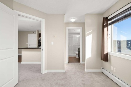 3309-403 Mackenzie Way Sw, Airdrie, AB - Indoor Photo Showing Other Room