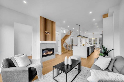 3404 2 Street Nw, Calgary, AB - Indoor Photo Showing Living Room With Fireplace