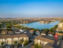 2105-11 Mahogany Row Se, Calgary, AB  - Outdoor With Body Of Water With View 