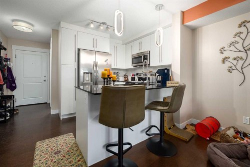 2105-11 Mahogany Row Se, Calgary, AB - Indoor Photo Showing Kitchen With Upgraded Kitchen