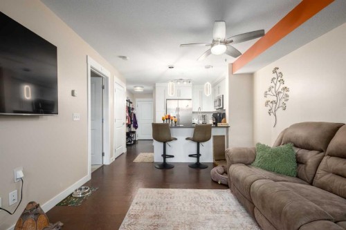 2105-11 Mahogany Row Se, Calgary, AB - Indoor Photo Showing Living Room