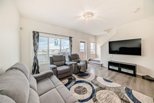163 Evanscrest Way Nw, Calgary, AB - Indoor Photo Showing Living Room