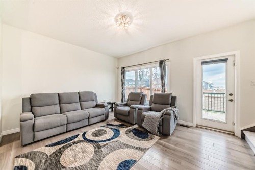 163 Evanscrest Way Nw, Calgary, AB - Indoor Photo Showing Living Room