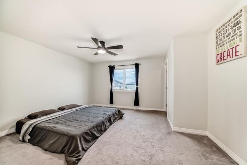 163 Evanscrest Way Nw, Calgary, AB - Indoor Photo Showing Bedroom