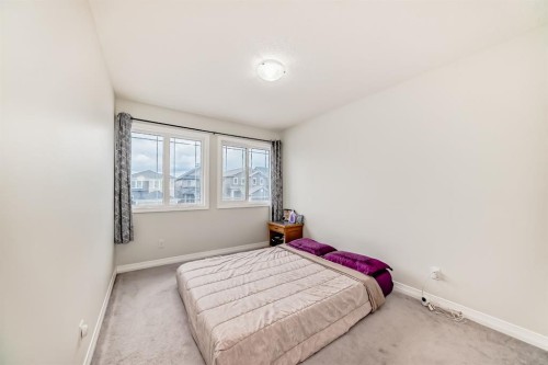 163 Evanscrest Way Nw, Calgary, AB - Indoor Photo Showing Bedroom