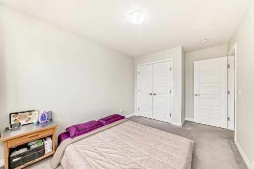 163 Evanscrest Way Nw, Calgary, AB - Indoor Photo Showing Bedroom