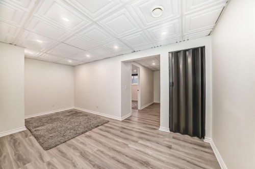 163 Evanscrest Way Nw, Calgary, AB - Indoor Photo Showing Other Room