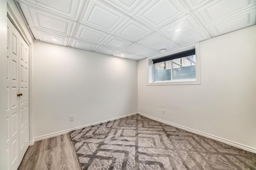163 Evanscrest Way Nw, Calgary, AB - Indoor Photo Showing Other Room
