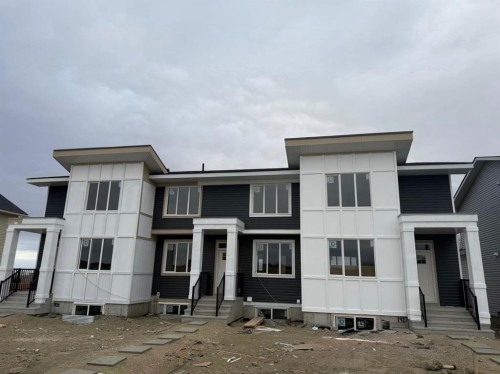 1927 Mccaskill Drive, Crossfield, AB - Outdoor With Facade