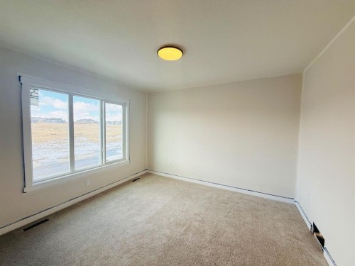 1931 Mccaskill Drive, Crossfield, AB - Indoor Photo Showing Other Room