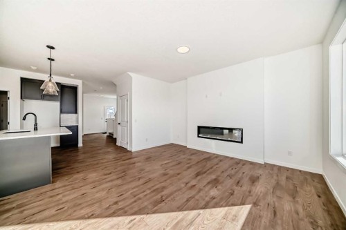 40 Southborough Common, Cochrane, AB - Indoor With Fireplace