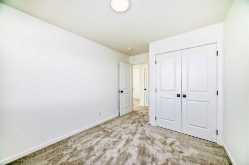 40 Southborough Common, Cochrane, AB - Indoor Photo Showing Other Room