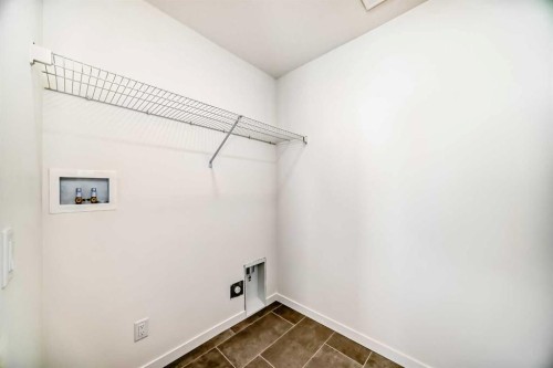 40 Southborough Common, Cochrane, AB - Indoor Photo Showing Other Room