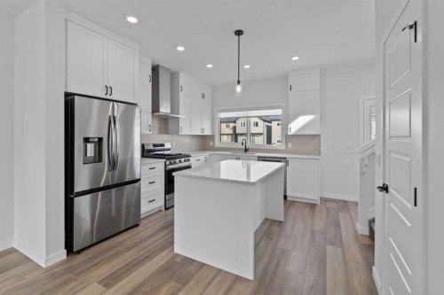994 Chinook Winds Meadow Sw, Airdrie, AB - Indoor Photo Showing Kitchen With Stainless Steel Kitchen With Upgraded Kitchen