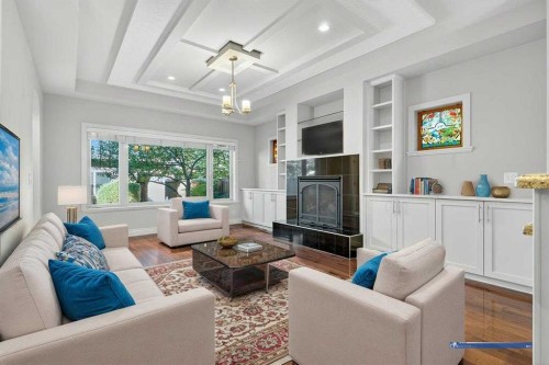 513 31 Street Nw, Calgary, AB - Indoor Photo Showing Living Room With Fireplace