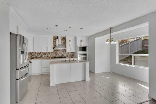 338 Panamount Drive Nw, Calgary, AB - Indoor Photo Showing Kitchen With Stainless Steel Kitchen With Upgraded Kitchen