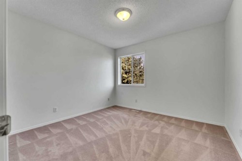 338 Panamount Drive Nw, Calgary, AB - Indoor Photo Showing Other Room