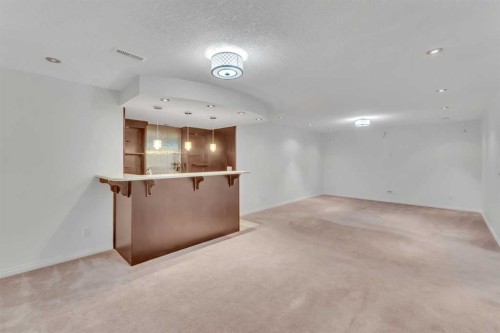 338 Panamount Drive Nw, Calgary, AB - Indoor Photo Showing Other Room