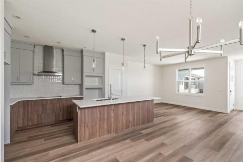 10 Herron Common Ne, Calgary, AB - Indoor Photo Showing Kitchen With Upgraded Kitchen