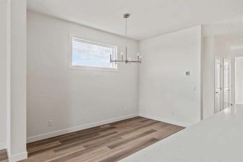 10 Herron Common Ne, Calgary, AB - Indoor Photo Showing Other Room