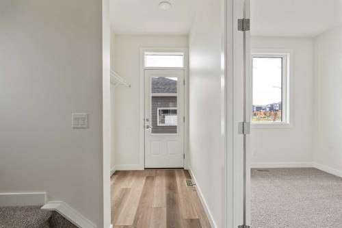 10 Herron Common Ne, Calgary, AB - Indoor Photo Showing Other Room