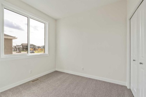 10 Herron Common Ne, Calgary, AB - Indoor Photo Showing Other Room