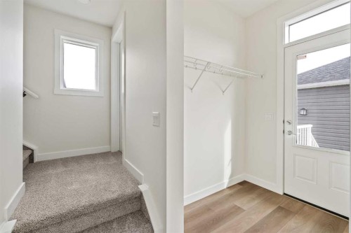 10 Herron Common Ne, Calgary, AB - Indoor Photo Showing Other Room