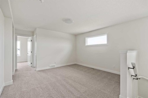 10 Herron Common Ne, Calgary, AB - Indoor Photo Showing Other Room