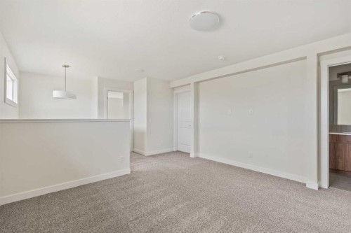 10 Herron Common Ne, Calgary, AB - Indoor Photo Showing Other Room