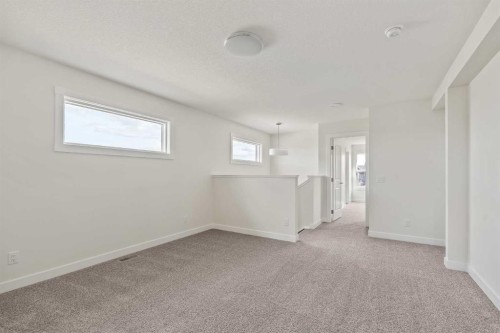 10 Herron Common Ne, Calgary, AB - Indoor Photo Showing Other Room