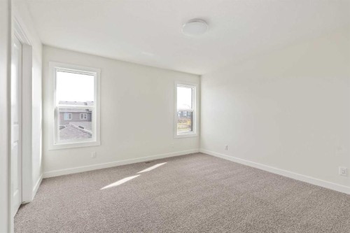 10 Herron Common Ne, Calgary, AB - Indoor Photo Showing Other Room