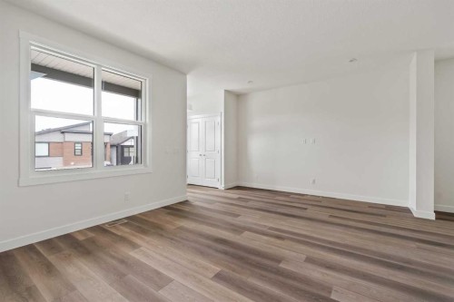 10 Herron Common Ne, Calgary, AB - Indoor Photo Showing Other Room