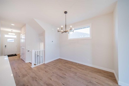 22 Herron Common Ne, Calgary, AB - Indoor Photo Showing Other Room