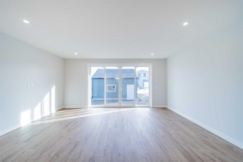 22 Herron Common Ne, Calgary, AB - Indoor Photo Showing Other Room