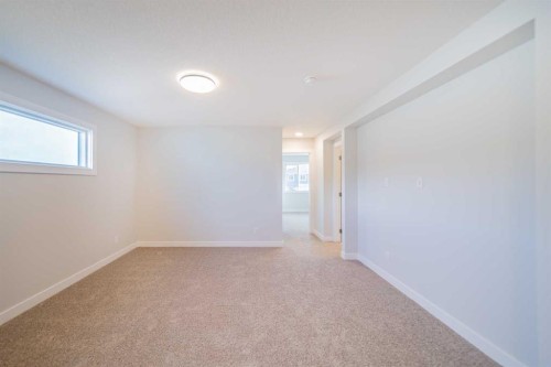 22 Herron Common Ne, Calgary, AB - Indoor Photo Showing Other Room