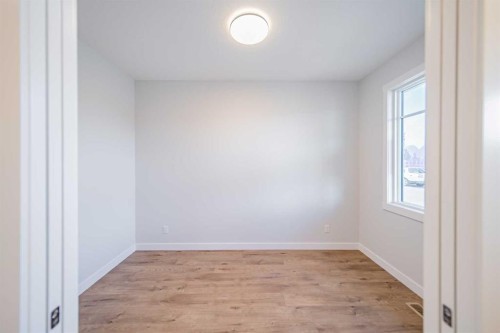 22 Herron Common Ne, Calgary, AB - Indoor Photo Showing Other Room