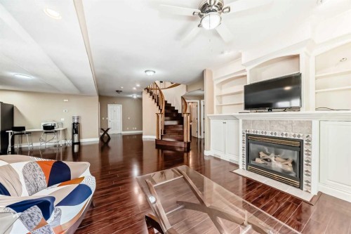 29 Simcoe Gate Sw, Calgary, AB - Indoor Photo Showing Living Room With Fireplace