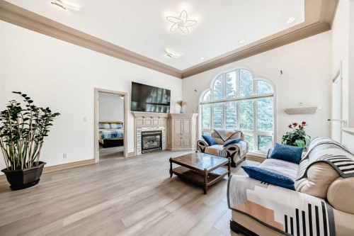29 Simcoe Gate Sw, Calgary, AB - Indoor Photo Showing Living Room With Fireplace