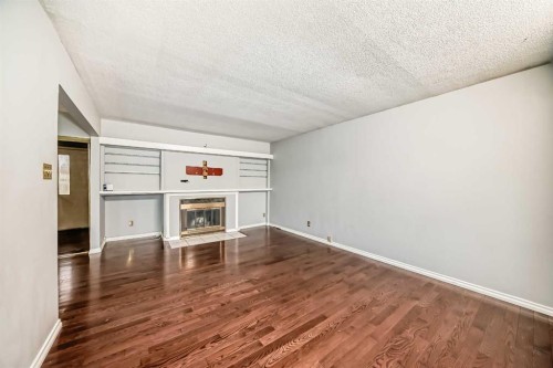1403 19 Street Ne, Calgary, AB - Indoor With Fireplace