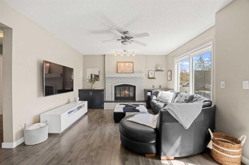 34 Sunhaven Link Se, Calgary, AB - Indoor Photo Showing Living Room With Fireplace