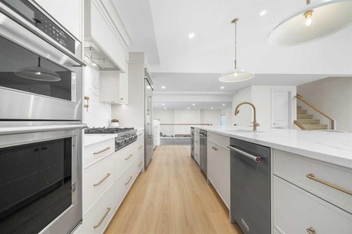 1016 Mapleglade Drive Se, Calgary, AB - Indoor Photo Showing Kitchen With Upgraded Kitchen
