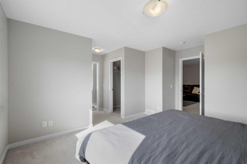 33 Walcrest Way Se, Calgary, AB - Indoor Photo Showing Bedroom