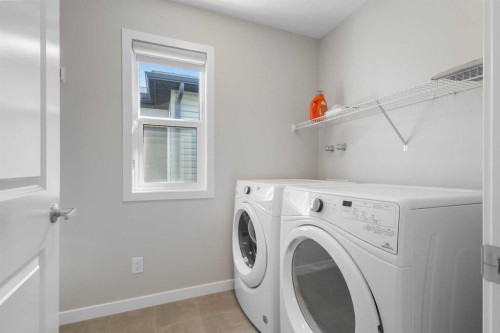 33 Walcrest Way Se, Calgary, AB - Indoor Photo Showing Laundry Room