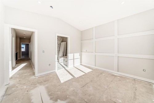 512 Heritage Boulevard, Cochrane, AB - Indoor Photo Showing Other Room
