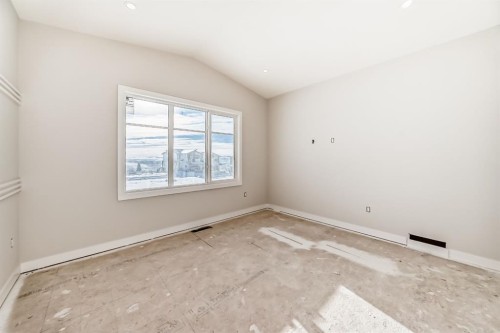 512 Heritage Boulevard, Cochrane, AB - Indoor Photo Showing Other Room